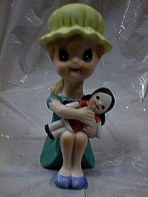 Ceramic Girl Holding a Doll a.JPG (47658 bytes)