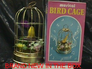 musical bird cage a.jpg (25674 bytes)